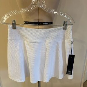 White Textured Women's Skort . The item is lined with shorts. Size Womens Medium